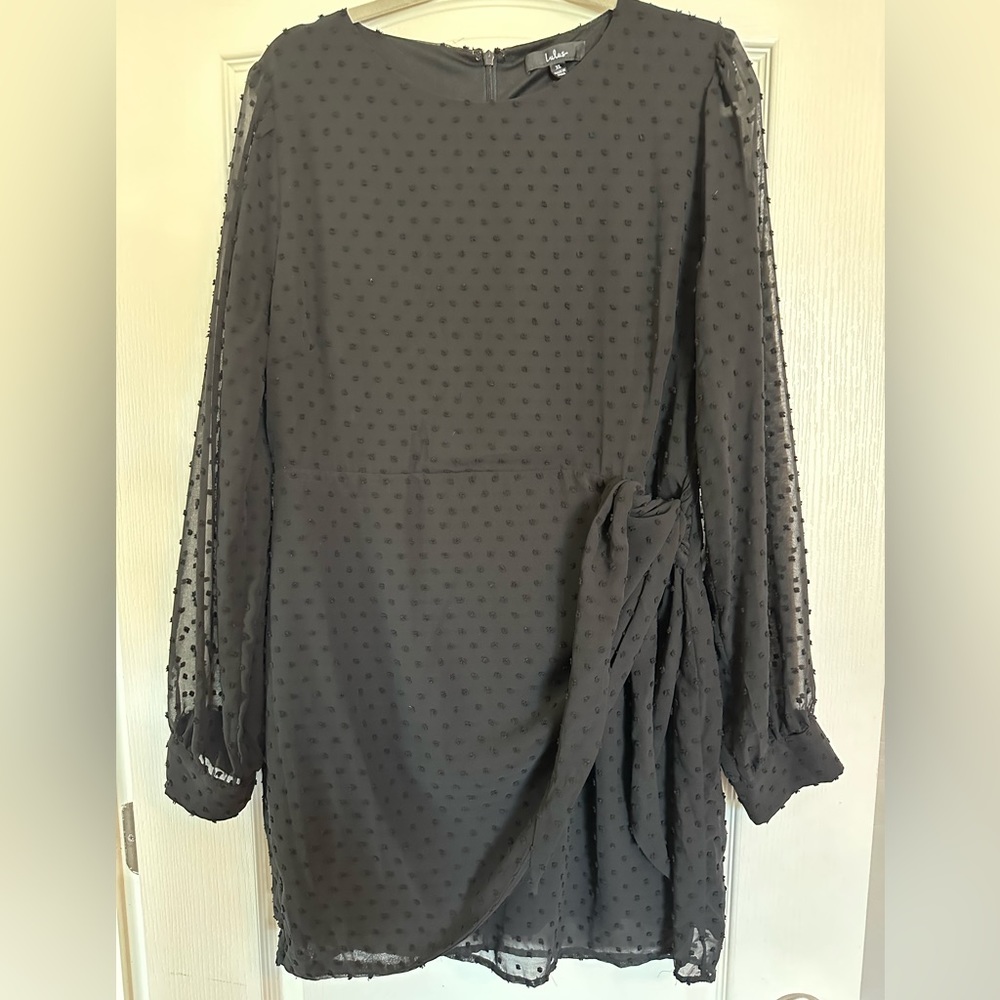 Black long sleeve Lulu’s dress.